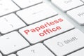 Finance concept: Paperless Office on computer keyboard background Royalty Free Stock Photo