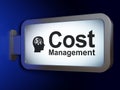 Finance concept: Cost Management and Head With Finance Symbol on billboard background