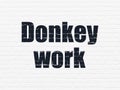 Finance concept: Donkey Work on wall background Royalty Free Stock Photo