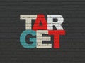 Finance concept: Target on wall background