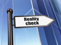 Finance concept: sign Reality Check on Building background Royalty Free Stock Photo
