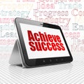 Finance concept: Tablet Computer with Achieve Success on display Royalty Free Stock Photo