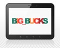 Finance concept: Tablet Pc Computer with Big bucks on display Royalty Free Stock Photo