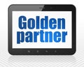 Finance concept: Tablet Pc Computer with Golden Partner on display Royalty Free Stock Photo