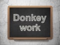 Finance concept: Donkey Work on chalkboard background Royalty Free Stock Photo