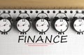 Finance Text Note Pad And Clock On Wood Desk Focused Imag Royalty Free Stock Photo