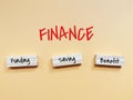 Finance flow concept. Funding, saving and benefit written on wooden blocks. Royalty Free Stock Photo