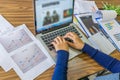 High angle view of financial accountant working on computer