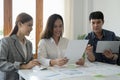 Financial,accounting, investment advisor consulting with her team at office. Teamwork Meeting Concept Royalty Free Stock Photo