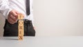 Financial adviser making a stack of wooden blocks spelling Forex Royalty Free Stock Photo