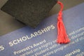Financial Aid for Higher Education Symbolized by Scholarships Paper Royalty Free Stock Photo