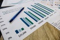 financial and business color charts and graphs on the table Royalty Free Stock Photo