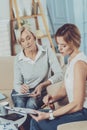 Positive smart women doing calculations