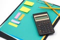 Financial calculator and office supplies Royalty Free Stock Photo