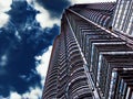 Financial center skyscraper on stormy sky background digital illustration. Tall modern building view from below. Royalty Free Stock Photo