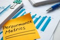Financial charts and performance metrics mark.