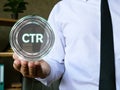 Financial concept about Click-Through Rate CTR with phrase on the piece of paper Royalty Free Stock Photo