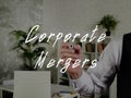 Financial concept about Corporate Mergers with phrase on the sheet