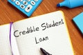 Financial concept about Credible Student Loan with inscription on the sheet