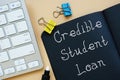 Financial concept about Credible Student Loan with inscription on the sheet