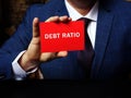 Financial concept about DEBT RATIO with phrase on the piece of paper. Business photo shows the ratio of total debt to total