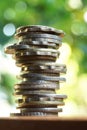 Financial concept, different coins stack with blur background