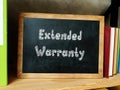 Financial concept about Extended Warranty with inscription on the piece of paper