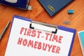 Financial concept about FIRST-TIME HOMEBUYER with inscription on the page