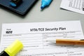 Financial concept about Form 15272 VITA/TCE Security Plan with inscription on the piece of paper