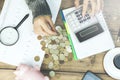 Woman hand magnifier and money Royalty Free Stock Photo