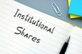 Financial concept about Institutional Shares with inscription on the sheet Royalty Free Stock Photo