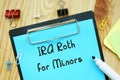 Financial concept about IRA Roth For Minors with sign on the piece of paper