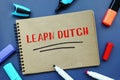Financial concept about LEARN DUTCH with sign on the piece of paper