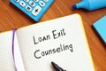 Financial concept about Loan Exit Counseling with phrase on the piece of paper