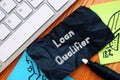 Financial concept about Loan Qualifier with phrase on the sheet Royalty Free Stock Photo