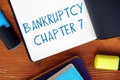 Financial concept meaning BANKRUPTCY CHAPTER 7 exclamation marks with phrase on the page