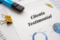 Financial concept meaning Clients Testimonial with phrase on the piece of paper