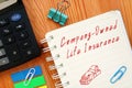 Financial concept meaning Company-Owned Life Insurance COLI with phrase on the piece of paper