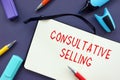 Financial concept meaning Consultative Selling with sign on the piece of paper