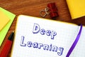 Financial concept meaning Deep Learning with phrase on the piece of paper Royalty Free Stock Photo