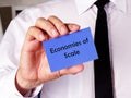 Financial concept meaning Economies of Scale with sign on the sheet