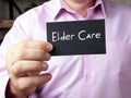 Financial concept meaning Elder Care with sign on the piece of paper