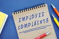 Financial concept meaning Employee Complaints with sign on the piece of paper