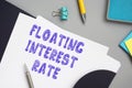 Financial concept meaning FLOATING INTEREST RATE with inscription on the sheet Royalty Free Stock Photo