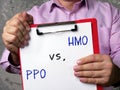 Financial concept meaning health maintenance organization HMO vs. PPO Preferred provider organization with phrase on the page