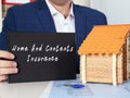Financial concept meaning Home And Contents Insurance with sign on blank notepad Royalty Free Stock Photo