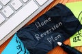 Financial concept meaning Home Reversion Plan with sign on the piece of paper Royalty Free Stock Photo