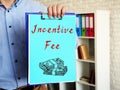 Financial concept meaning Incentive Fee with phrase on the piece of paper Royalty Free Stock Photo
