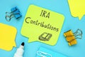 Financial concept meaning IRA Contributions with inscription on the page