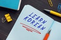 Financial concept meaning LEARN KOREAN with inscription on the page